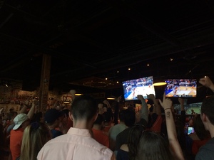 SU students celebrate at Chuck's Cafe on Sunday, as the men's basketball team beat Virginia to advance to the Final Four.