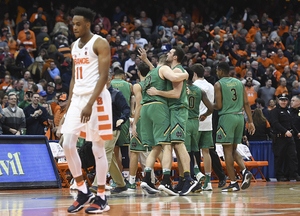 Oshae Brissett walked off the floor as Notre Dame celebrated its last-second win on the Carrier Dome floor.