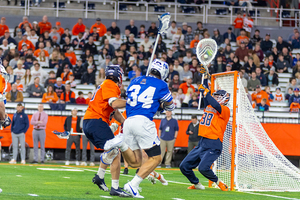 No. 6 Syracuse held Brennan O'Neill (pictured, No. 34) to just one goal in its win over Duke.