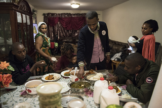 Every refugee settled by Interfaith Works enjoys a first meal with their host family.