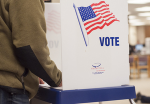 A voter casts a ballot for the local election Tuesday at Bird Library. The ballot included candidates for Onondaga County legislatures, city court judges, president of common council, city mayor and more. Incumbent Democratic candidate Stephanie Miner won the mayoral race.