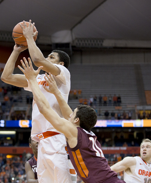 Syracuse forward Michael Gbinije elevates to sink the game-winning shot from the left block, and push the Orange past Virginia Tech on Tuesday night.