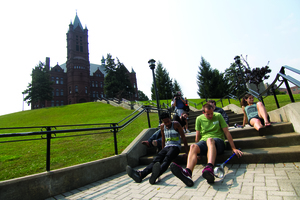 Members of the SU community crawled to steps of Crouse College to raise awareness for the “inaccessibility” of the city of Syracuse.