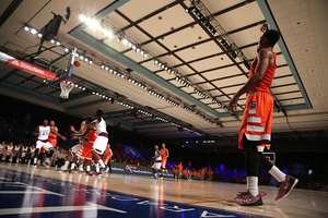 Michael Gbinije watches a 3-point attempt sail toward the net in Syracuse's win over Texas A&M on Friday. Gbinije was one of the main catalysts behind the Orange's perimeter success at the Battle 4 Atlantis. 