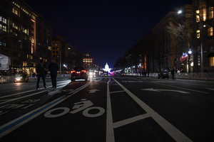 Tourists are allowed to walk along the parade route leading to the Capital Building the night before the Inauguration.