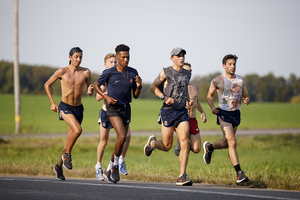 Aidan Tooker and Philo Germano of the SU cross country team helped the Syracuse relay medley team win on Saturday.