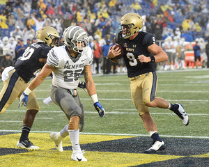 Zach Abey trudges forward on a rush attempt.