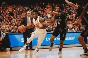 Tyus Battle drives to the basket in Syracuse's win over Georgetown. He caught fire and stayed hot Saturday.