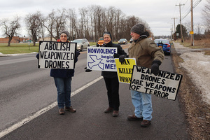 (From left) Ann Tiffany, Marilyn Goulet and Ed Kinane protested on Tuesday afternoon. 