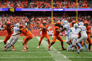 Sam Heckel (75), pictured against UNC in 2018, was a key part of a Syracuse offensive line that helped win the Camping World Bowl.