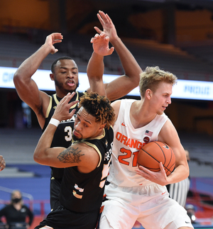 Marek Dolezaj had 20 points in Syracuse's narrow season-opener win over Bryant.