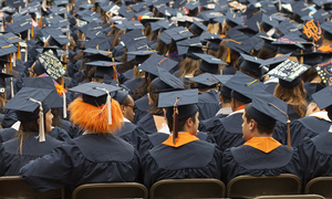 Syracuse University students sit in the Carrier Dome during the 2013 commencement ceremony. 

