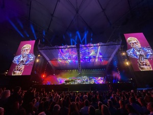 Elton John was adorned with a shimmery pink blazer as he performed his hits to an electric audience.