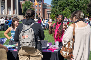 Vice President Sophia Castro and President Julia Kirezi of Planned Parenthood Generation Action interact with students at the SU Involvement Fair. The group hopes to increase outreach amid election season.