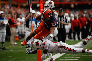 Prince-Tyson Gulley dives into the end zone for a touchdown in the first half.