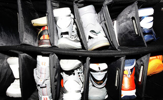 The sneakers of the Syracuse Orange are seen in a bag in the locker room during the Final Four interviews.