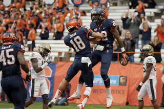 Cornelius celebrates with Clark.