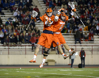 Staats and Rice celebrate after a hard shot to the top right side of the net. 