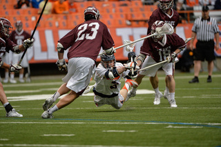 Billy Ward falls down while throwing a past to Randy Staats. Staats would score a goal on the play. 