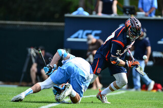 Williams wins a faceoff and heads downfield after scooping the ball up out of the scrum.