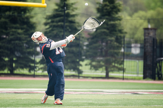 Molloy on the follow through of his first career goal, a last-second heave to make it 11-9. 