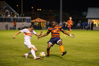 Kamal Miller defends a Clemson attacker. 