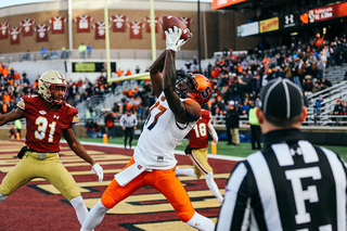 Custis reaches in the back of the end zone for his lone touchdown of the game.