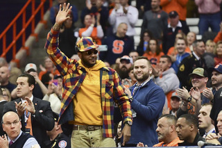 Former Syracuse star Carmelo Anthony watched the game from the front row and spoke to the team in the locker room before the game.